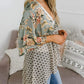 🌸Damska kardigan w kwiaty z falbanowymi rękawami i wiązaniem z przodu – zwiewne, luźne okrycia w stylu boho