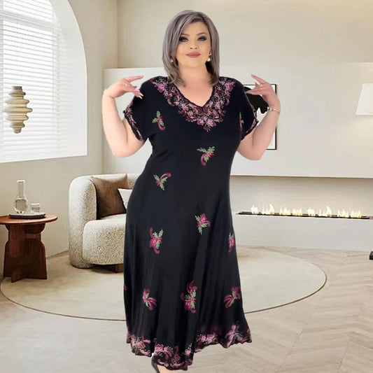 Zwiewna sukienka midi z dekoltem w serek Plus Size
