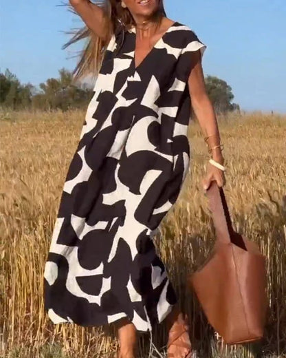 💕Sukienka z nadrukiem z dekoltem w szpic👗