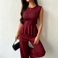 Damski dwuczęściowy zestaw: top bez rękawów z peplum i spodnie